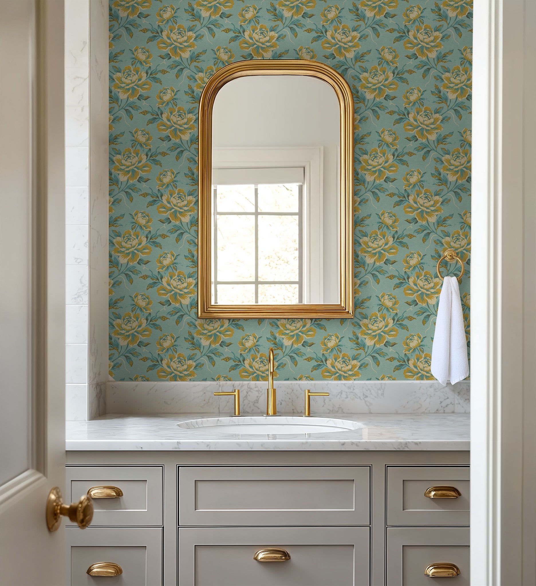 Bathroom with Floranza floral wallpaper in golden ochre and teal against turquoise