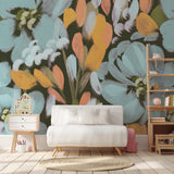 "Wall Blush Lily Wallpaper featured in a cozy children's room, highlighting the vibrant floral design."