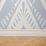 "Gloria Wallpaper by Wall Blush in a modern room, geometric pattern focus with beige wooden floor."
