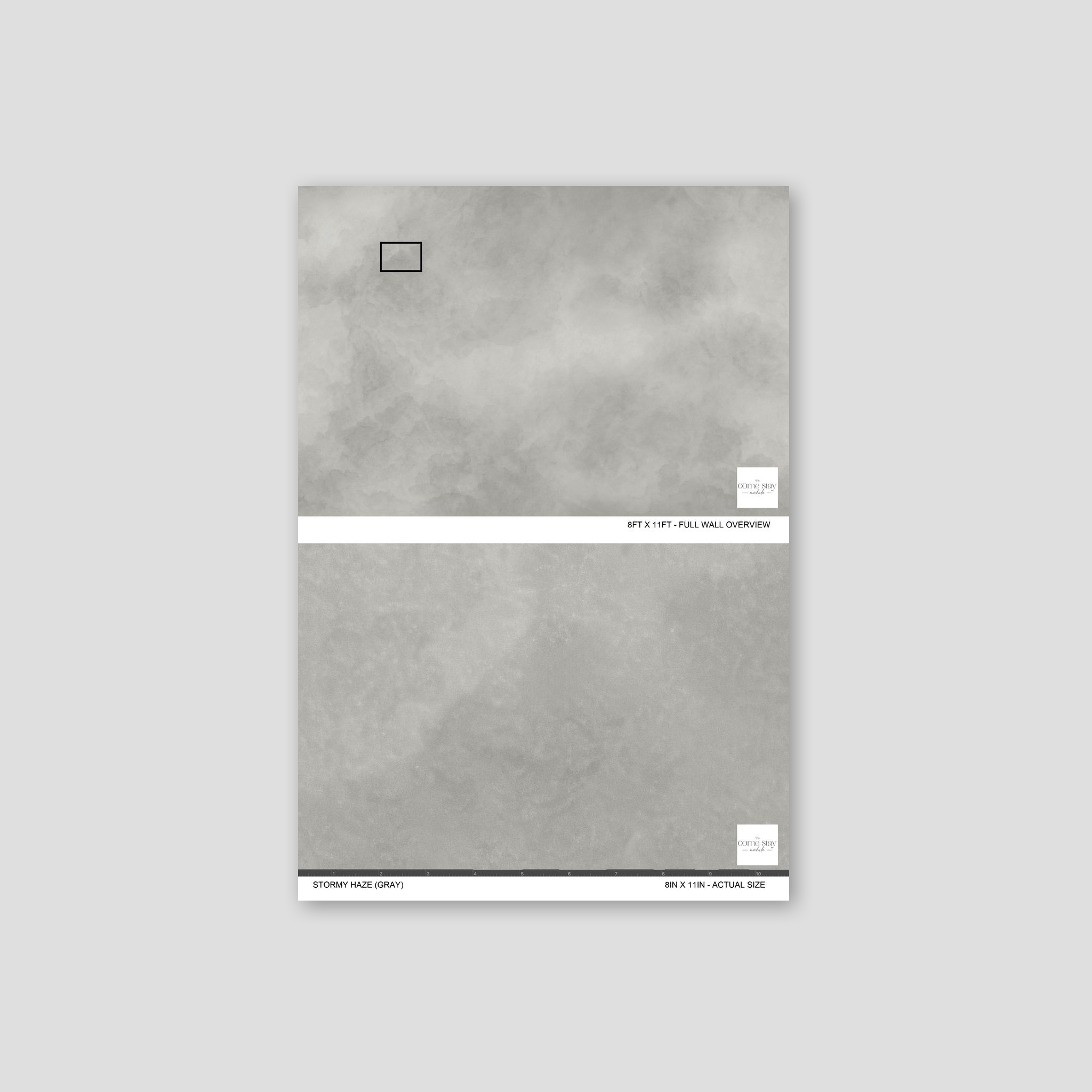 Gray abstract textured wallpaper sample with cloud-like pattern.