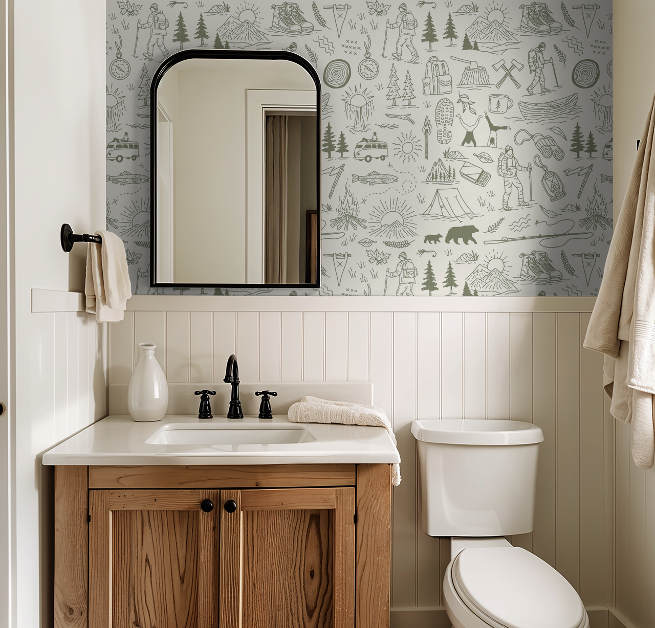Green and cream nature-themed wallpaper in rustic bathroom with wooden vanity.