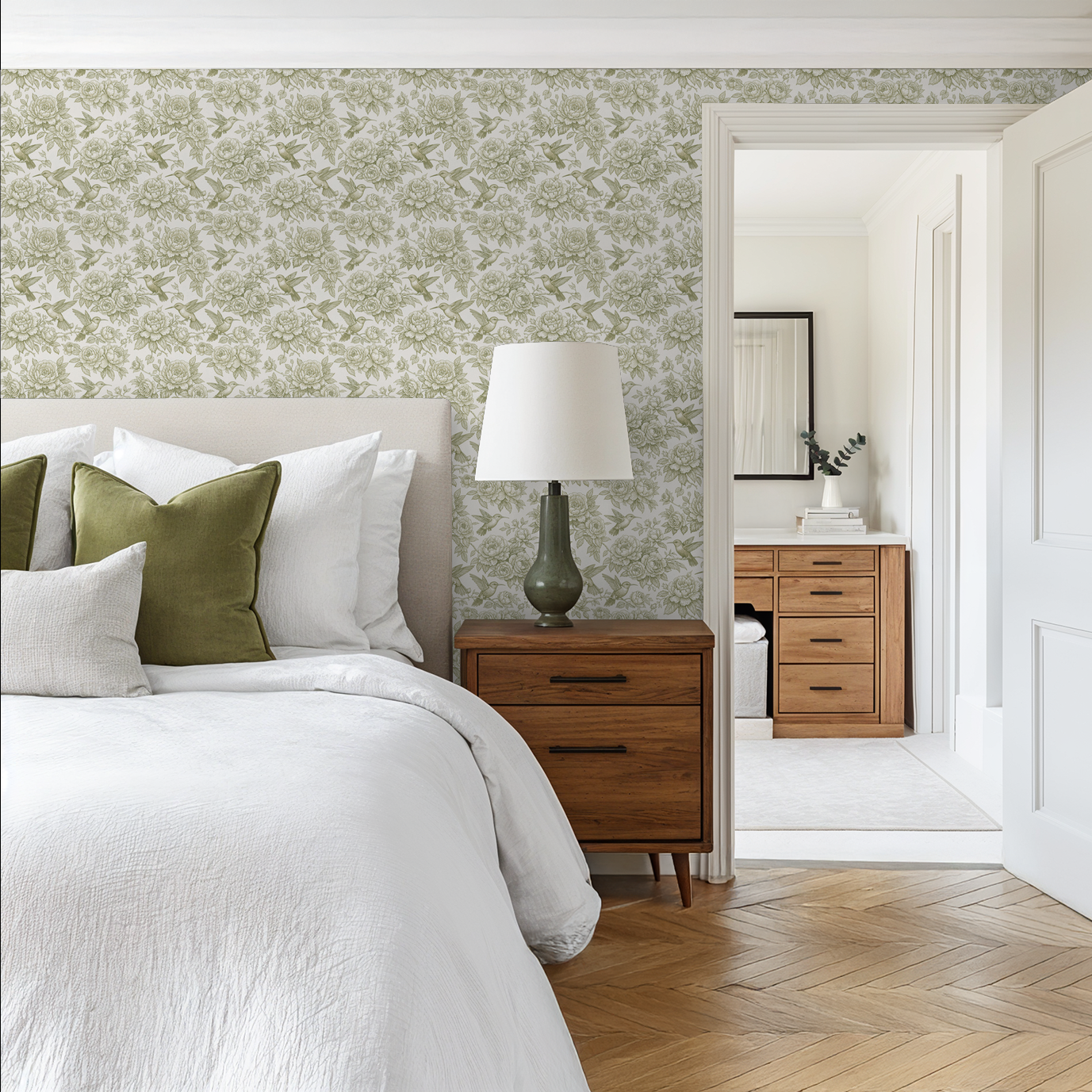 Bedroom with green floral hummingbird wallpaper and wooden furniture