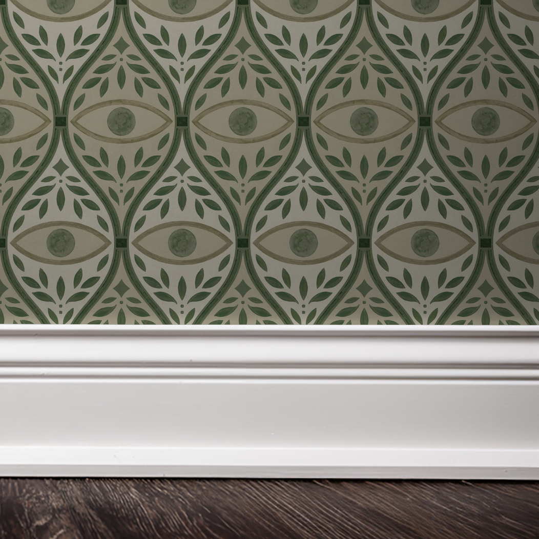 Green geometric leaf pattern wallpaper with white baseboard