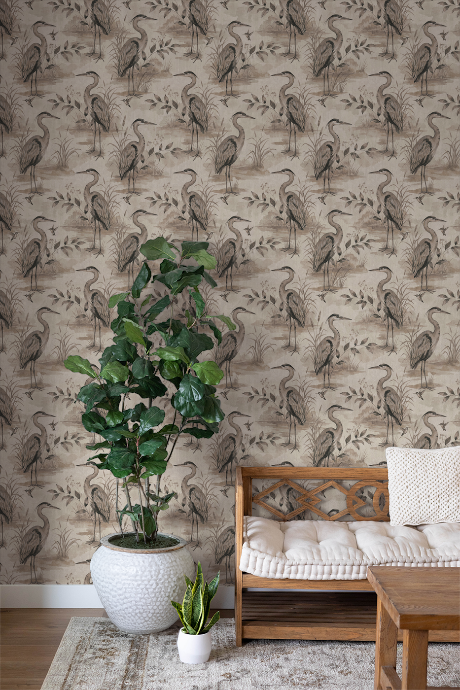 Heron Lake wallpaper with taupe herons and foliage in a cozy living room setting.