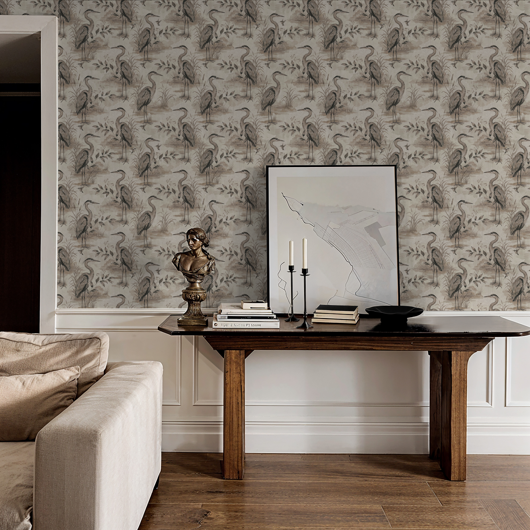 Heron Lake wallpaper with herons and foliage in taupe tones in a rustic living room.