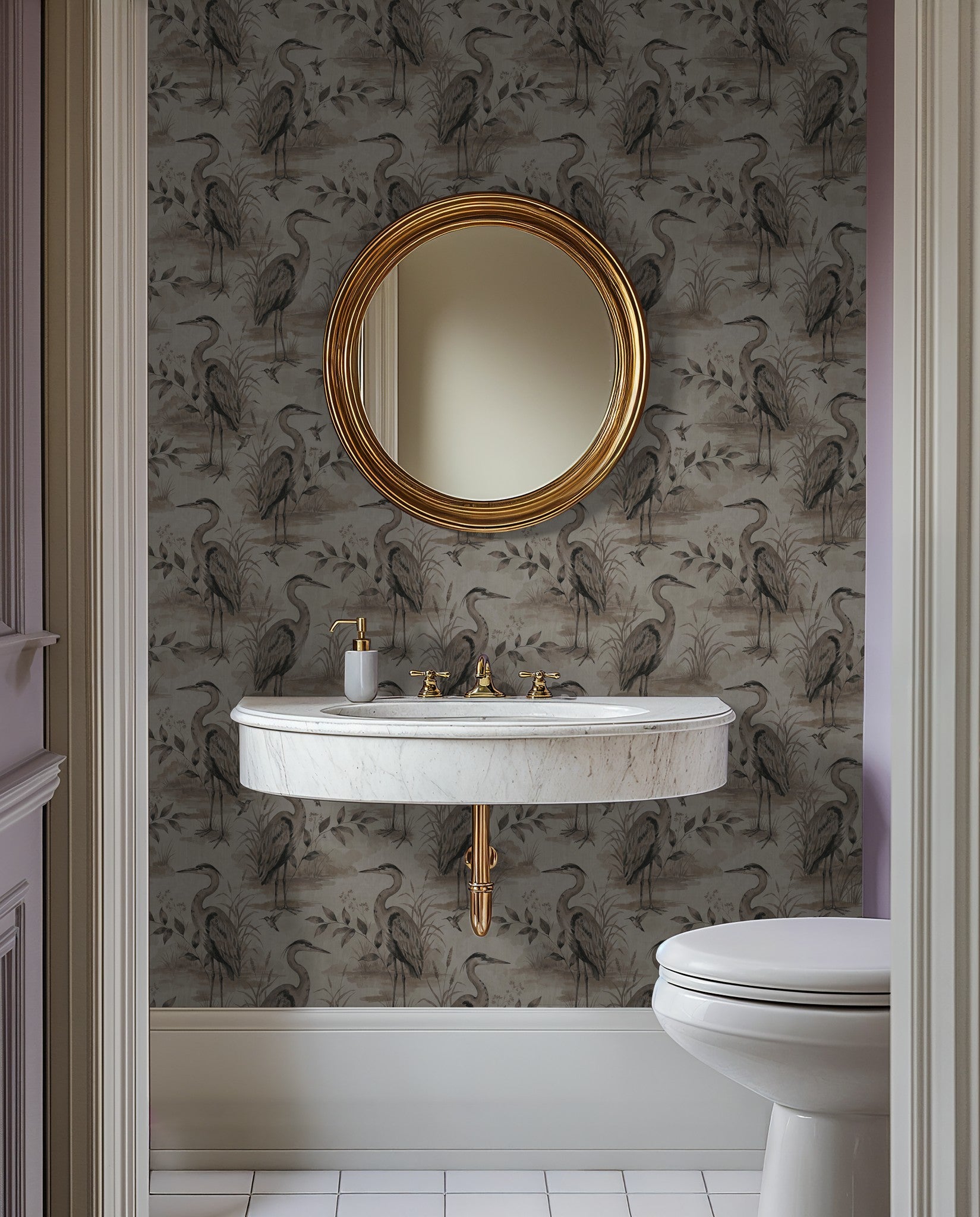 Heron Lake wallpaper with herons and foliage in taupe and sepia in elegant bathroom setting.