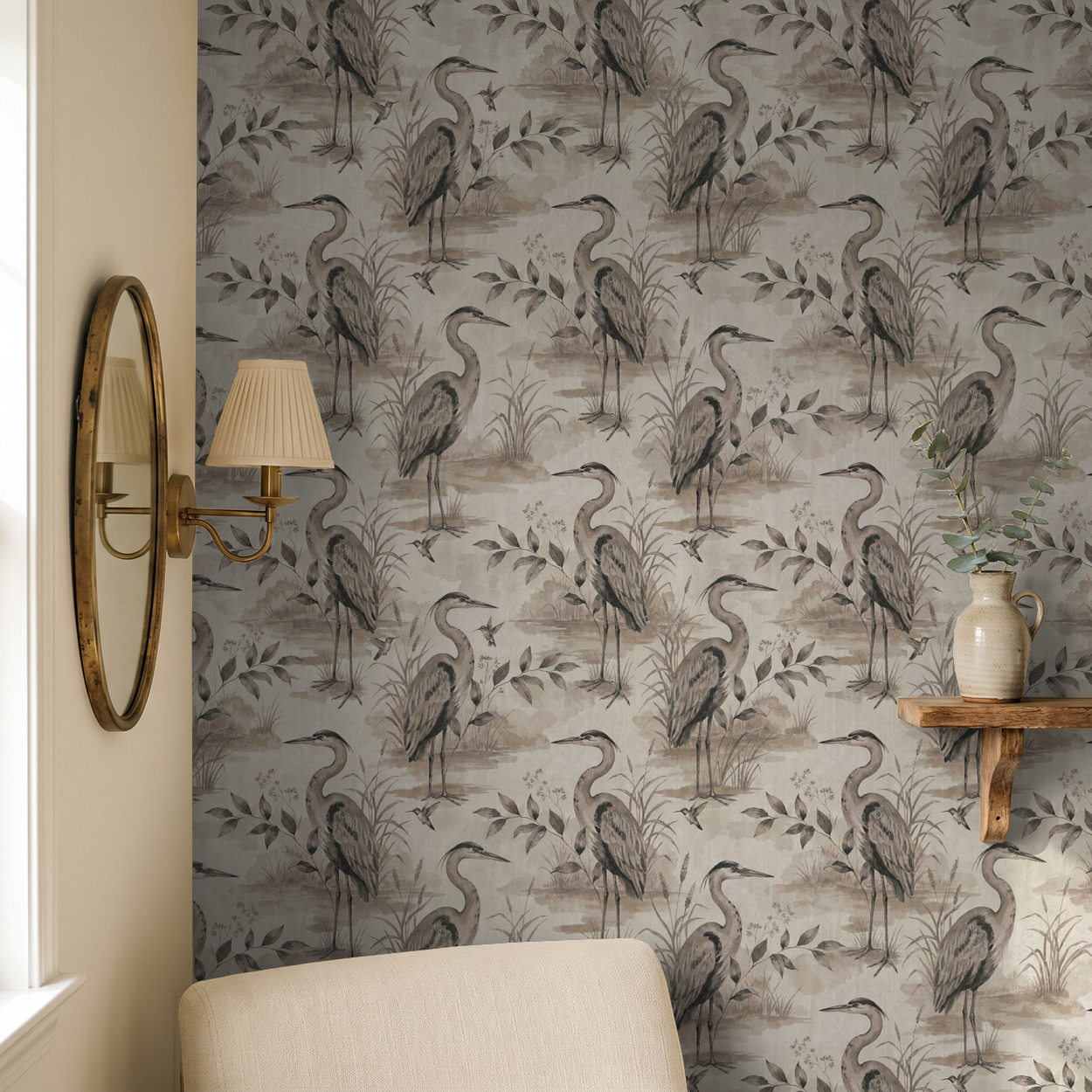 Heron Lake wallpaper with herons and foliage in taupe and sepia in a cozy room setting.