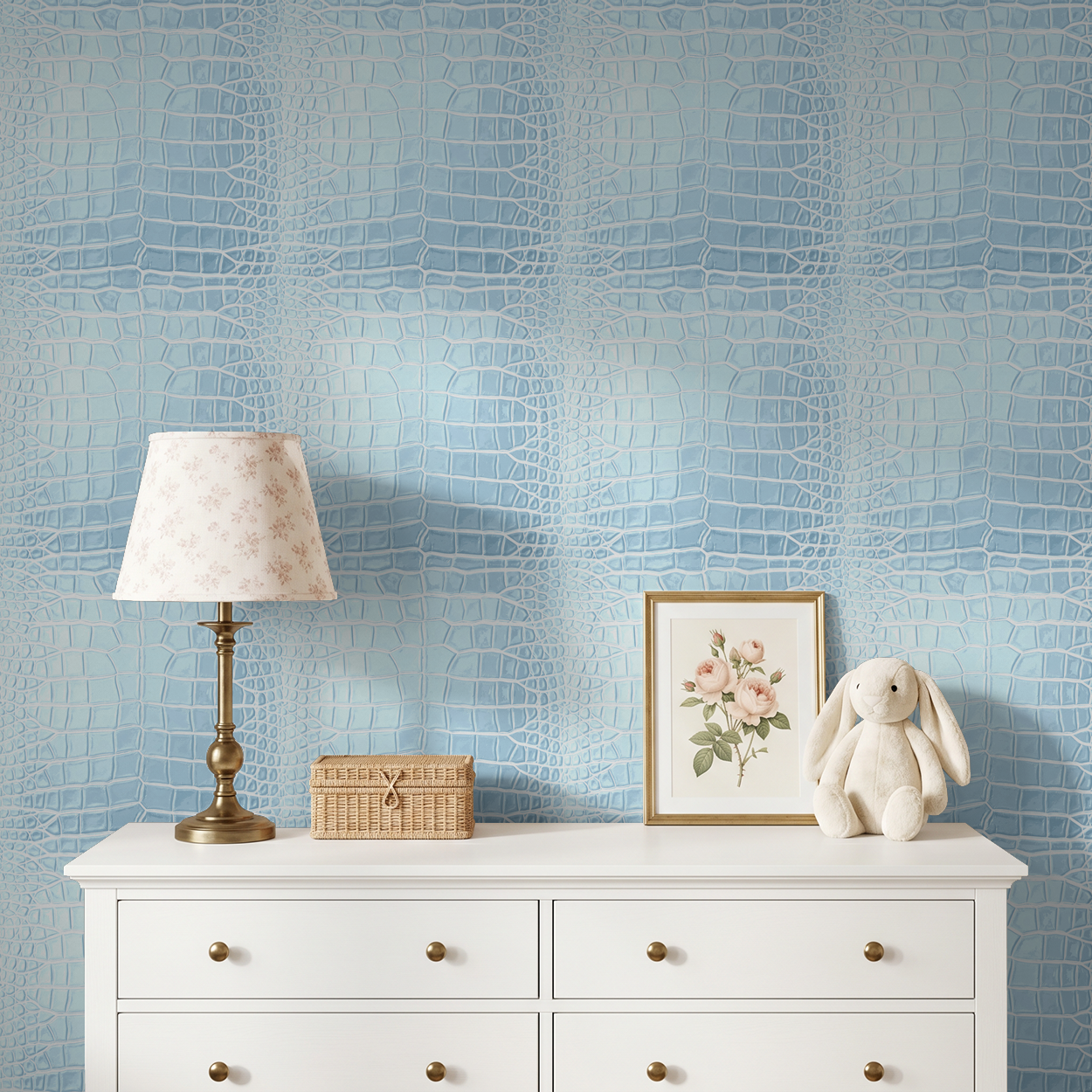Icy blue crocodile pattern wallpaper in a chic room with white dresser and decor.