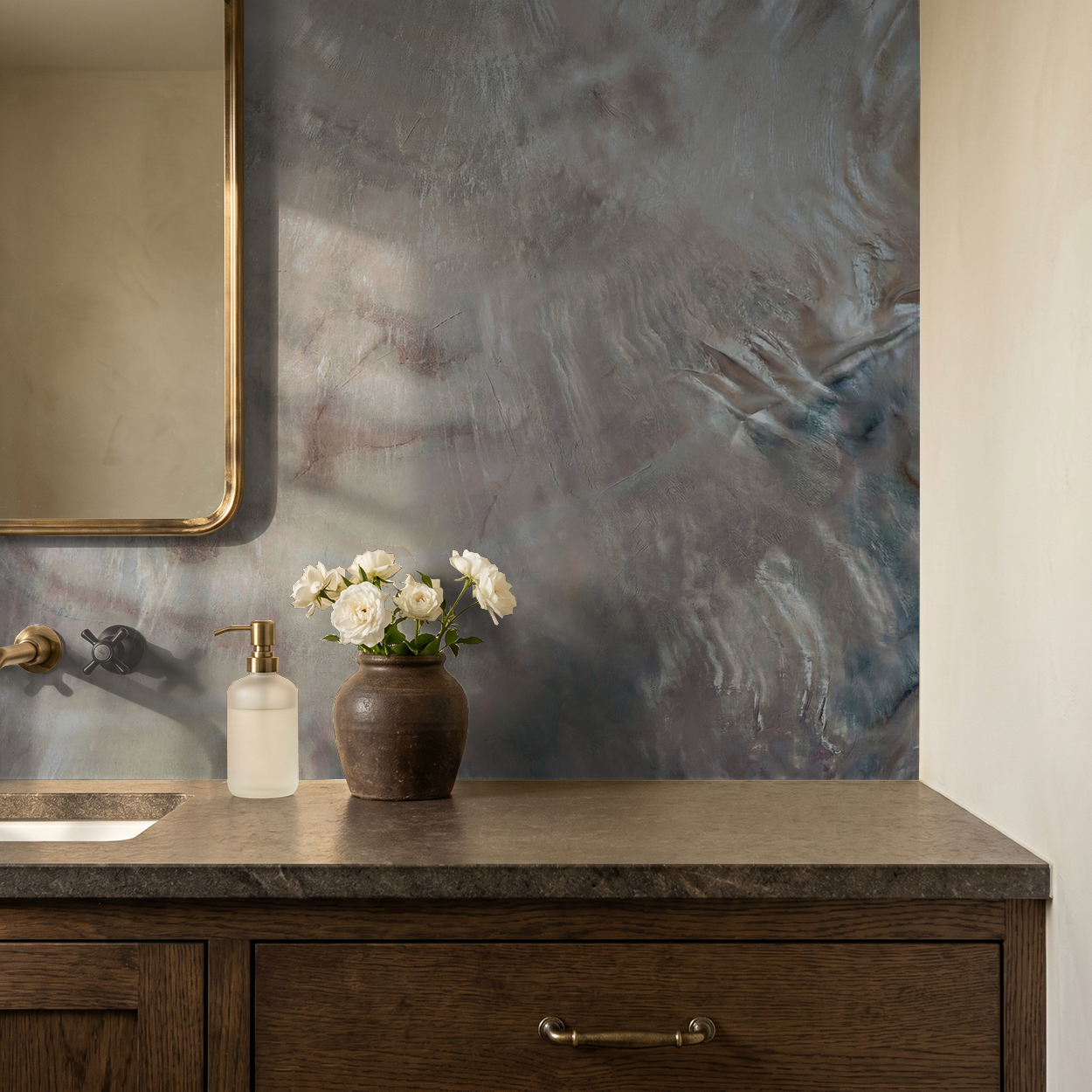 Iridescent textured wallpaper in serene bathroom with wooden vanity and flowers.