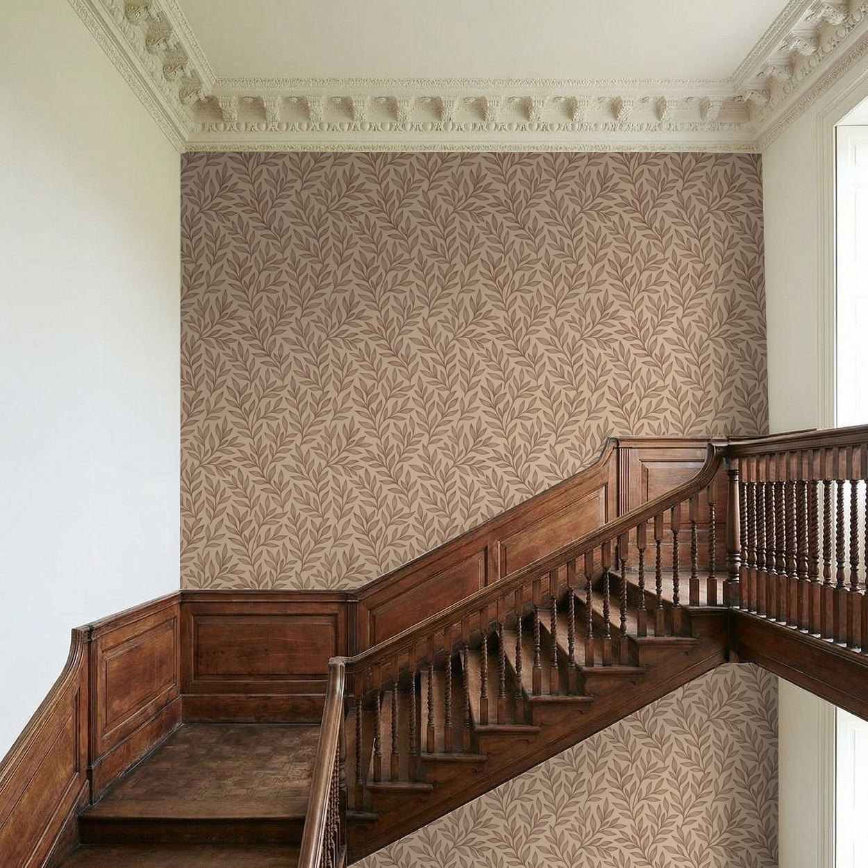 Elegant vine-patterned wallpaper in earthy brown on beige wall above wooden staircase.