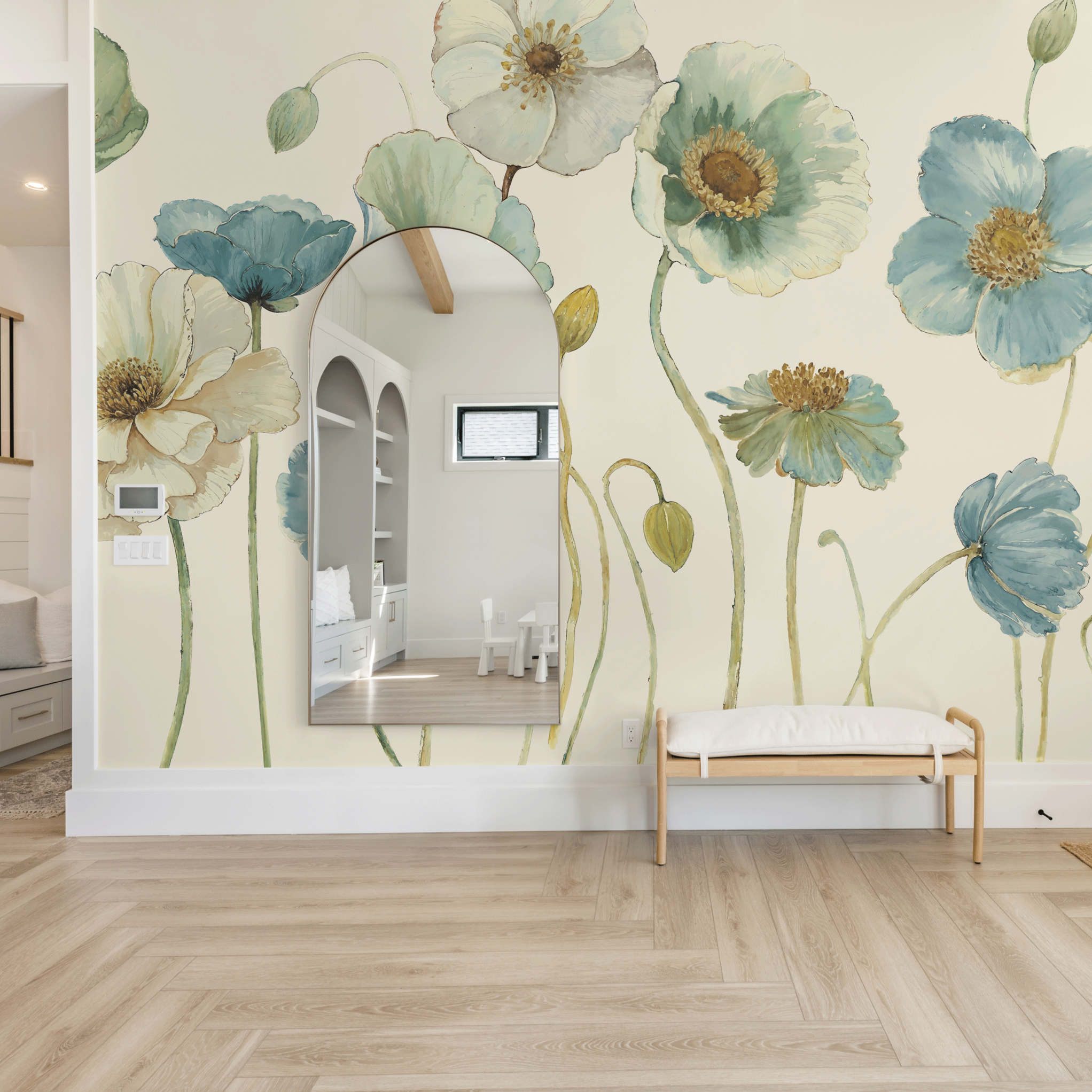 "Meadow Whispers (Cream) Wallpaper by Wall Blush in a modern living room, with focus on floral wall decor."