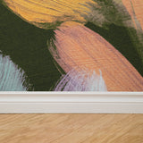 "Wall Blush Lily Wallpaper featuring colorful brush strokes in a modern living room interior."