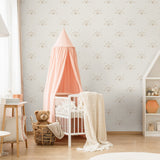 "Wall Blush's Whiskers Wallpaper showcased in a cozy nursery room, highlighting the chic and playful design."