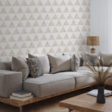 "Wall Blush Love Triangle Wallpaper in stylish modern living room with cozy neutral sofa set."