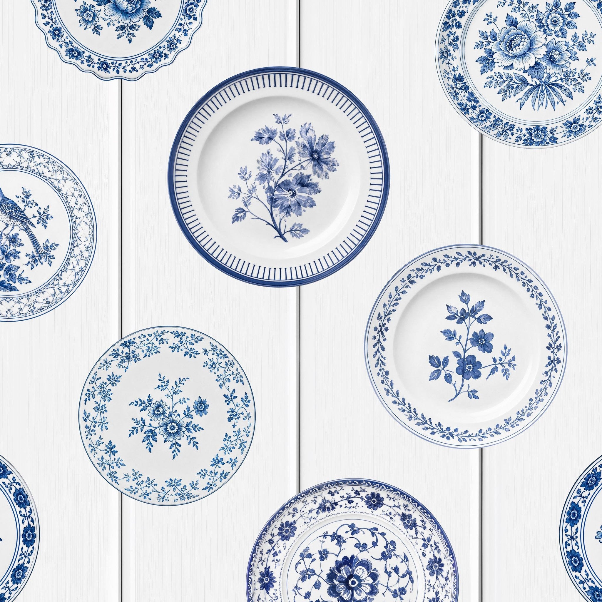 Maison Blue wallpaper with vintage blue floral porcelain plates on wood-grain background.