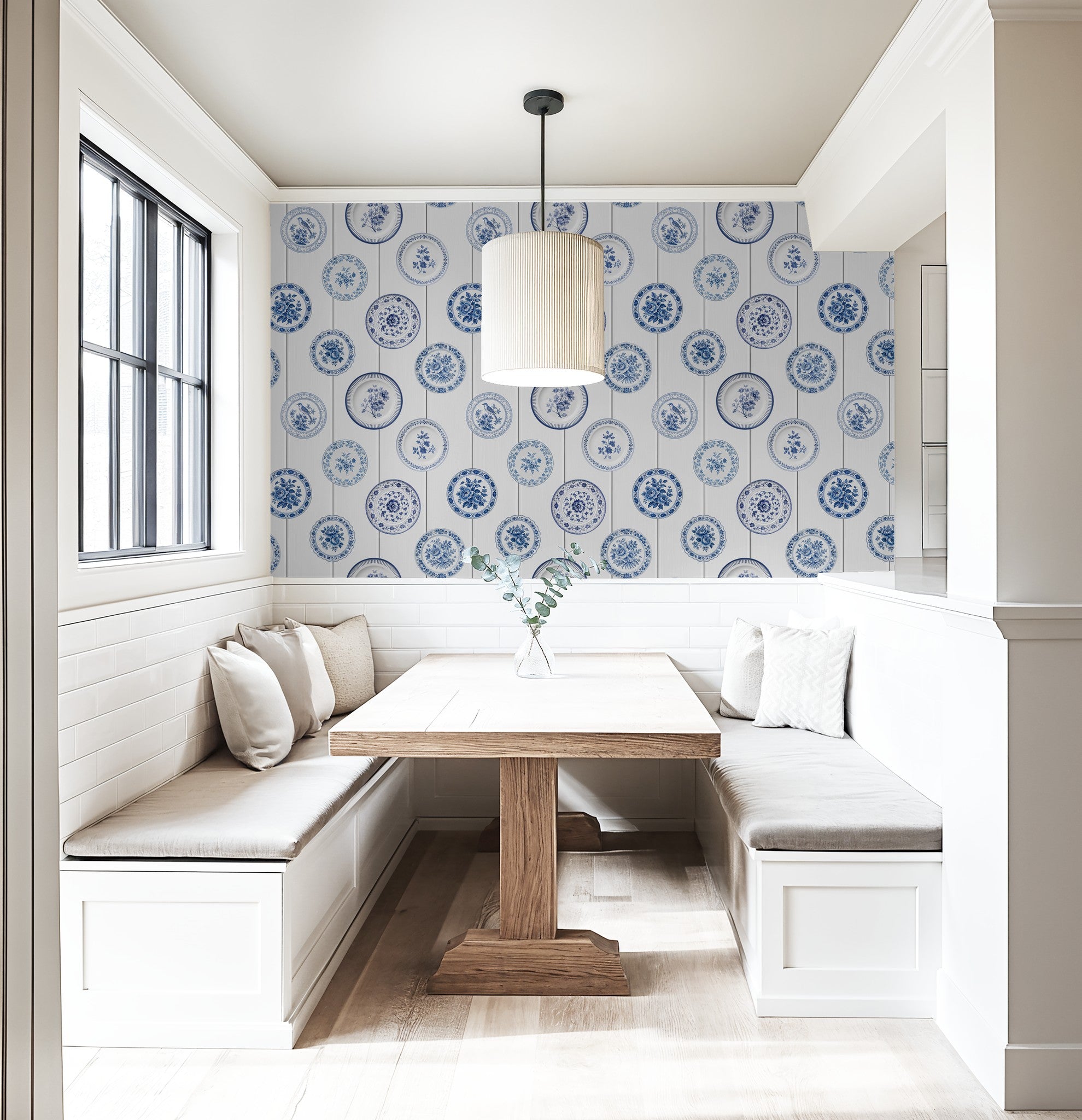 Maison Blue wallpaper with vintage blue porcelain plates in cozy dining nook.