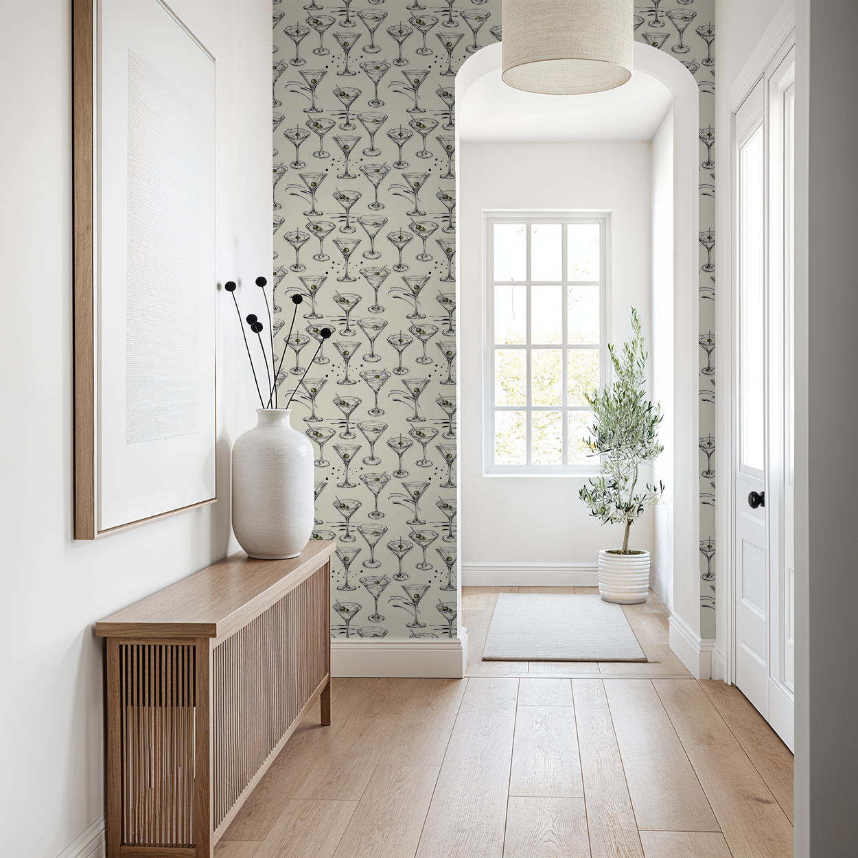 Martini glass wallpaper with olives in modern hallway, cream background.