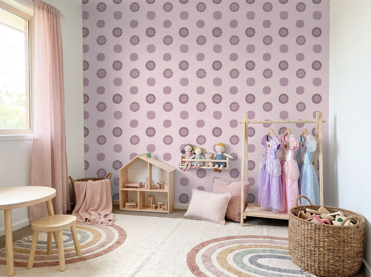 Mauve circle wallpaper in cozy kid's room with toys and pastel decor.