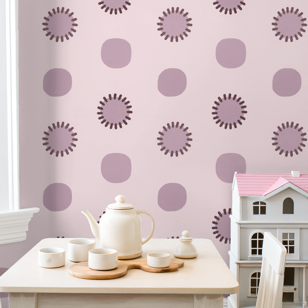 Mauve circle wallpaper in a playful nursery with toy house and tea set.