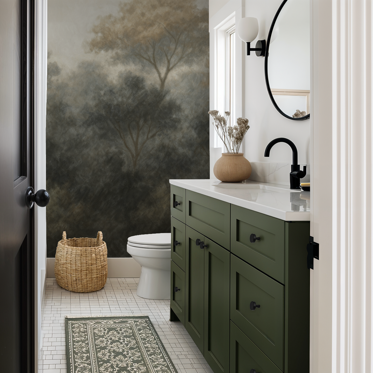 Misty forest wallpaper in a serene bathroom with green vanity and natural decor.