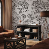 "Wall Blush's Midnight Flower Wallpaper enhancing a cozy living room ambiance with elegant floral patterns."