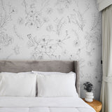 "Lined Meadow Wallpaper by Wall Blush in a serene bedroom, showcasing the detailed floral design as a focal point."