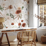 "Ana White floral wallpaper by Wall Blush enhancing a cozy home office ambiance."