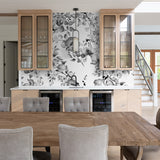 "Midnight Flower Wallpaper by Wall Blush accenting modern kitchen, focus on elegant floral design."