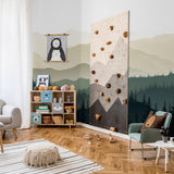 "Roam Wallpaper by Wall Blush in a stylish child's room, with mountain scenery design as the focal point."
