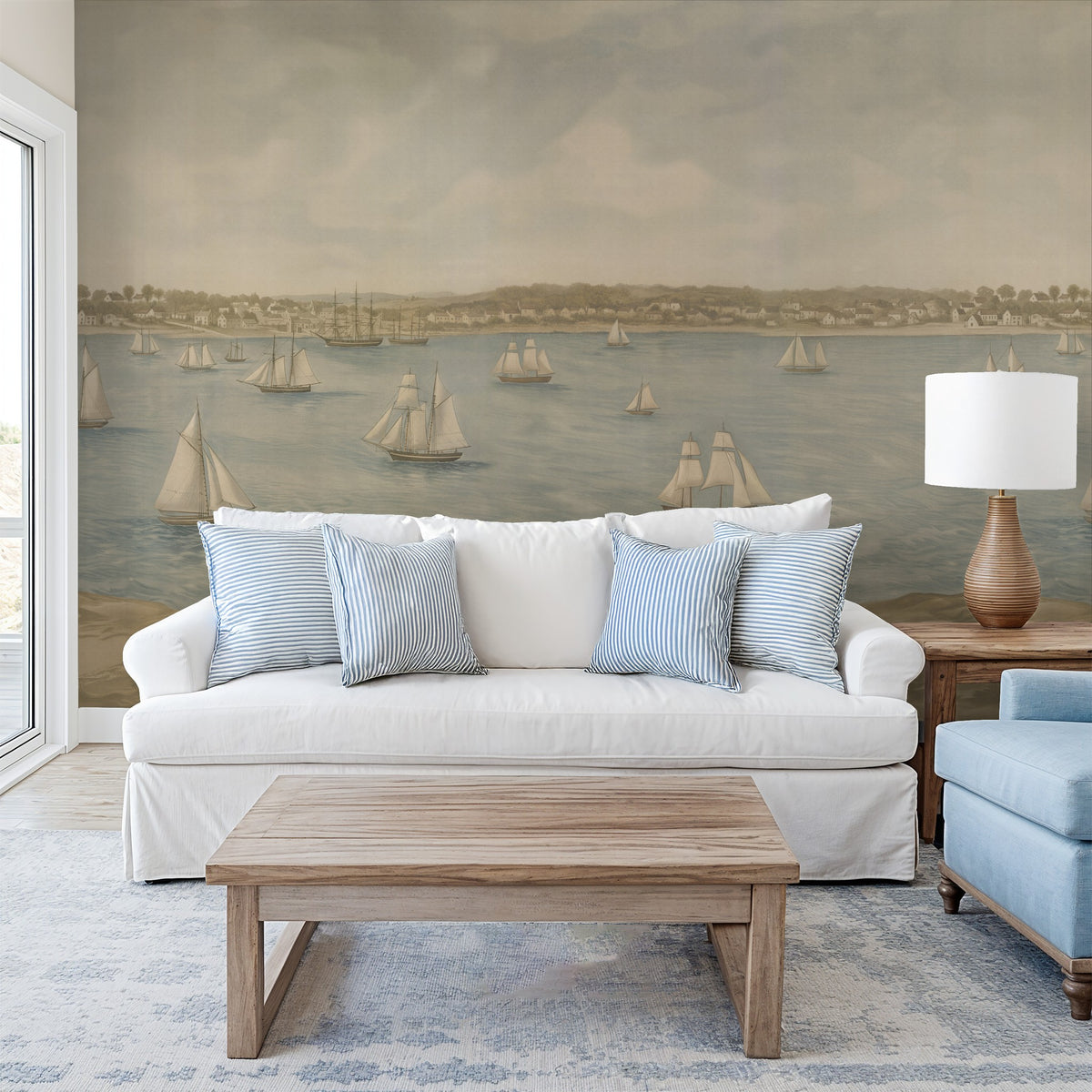 Nautical wallpaper with sailboats in serene coastal living room setting.
