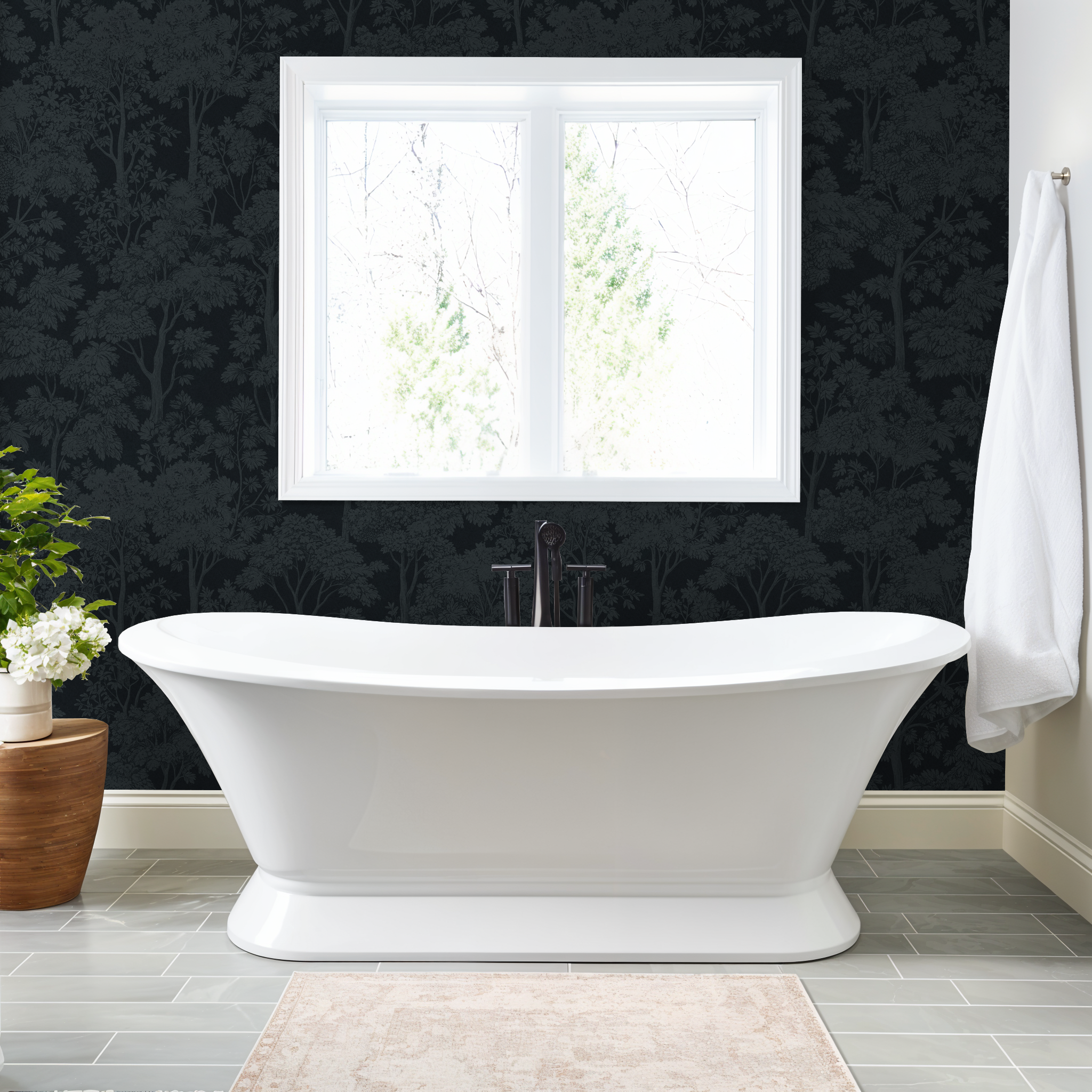 Navy tree silhouette wallpaper in elegant bathroom with white bathtub.