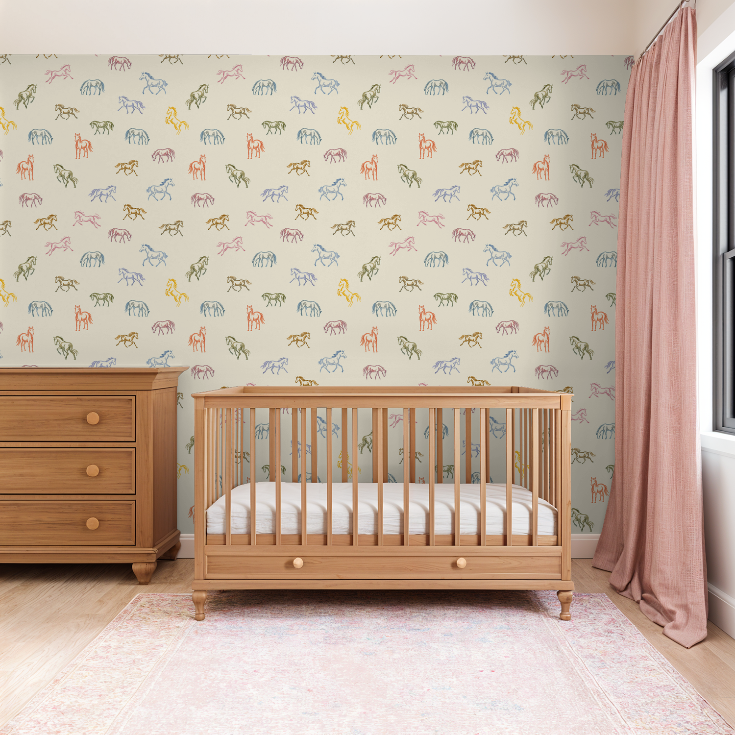 Nursery with pastel horse pattern wallpaper and wooden crib.