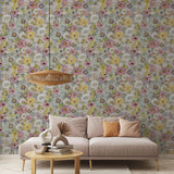 Phoebe Wallpaper from Wall Blush SG02 accentuates a cozy living room setting with a floral pattern.
