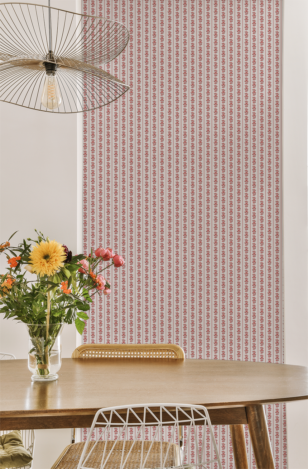 Pink floral striped wallpaper in dining room with modern decor