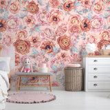 Blush Garden Wallpaper from The Nida Jahain Line in a cozy nursery room, with floral patterns as the centerpiece.
