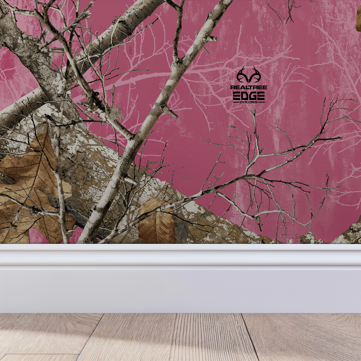 Rustic branches and leaves on vivid pink wallpaper in modern room setting.