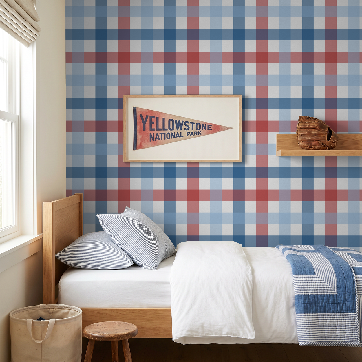 Red blue white gingham wallpaper in cozy bedroom with framed art and wooden bed.