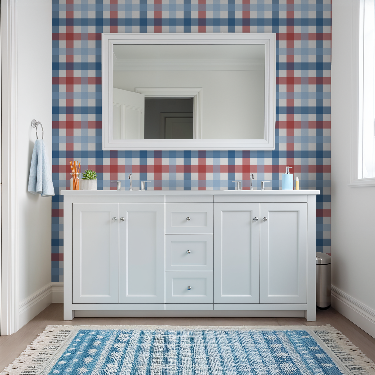 Red, blue, and white gingham wallpaper in modern bathroom with white vanity.