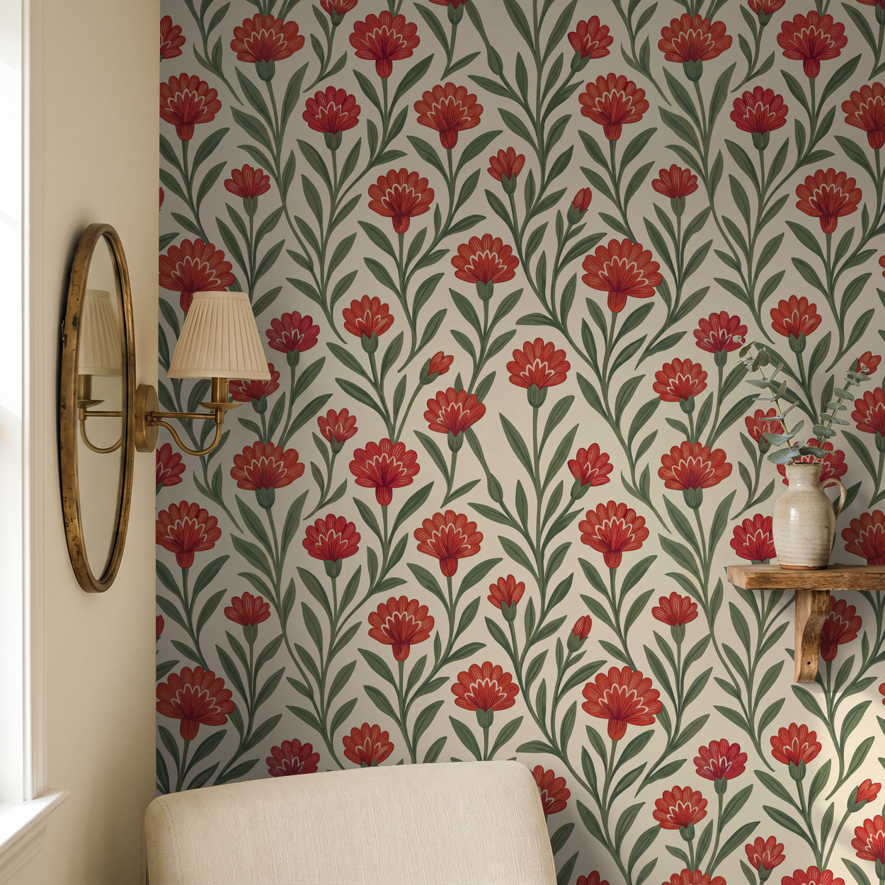 Red floral wallpaper with green leaves in cozy room setting with mirror and shelf.