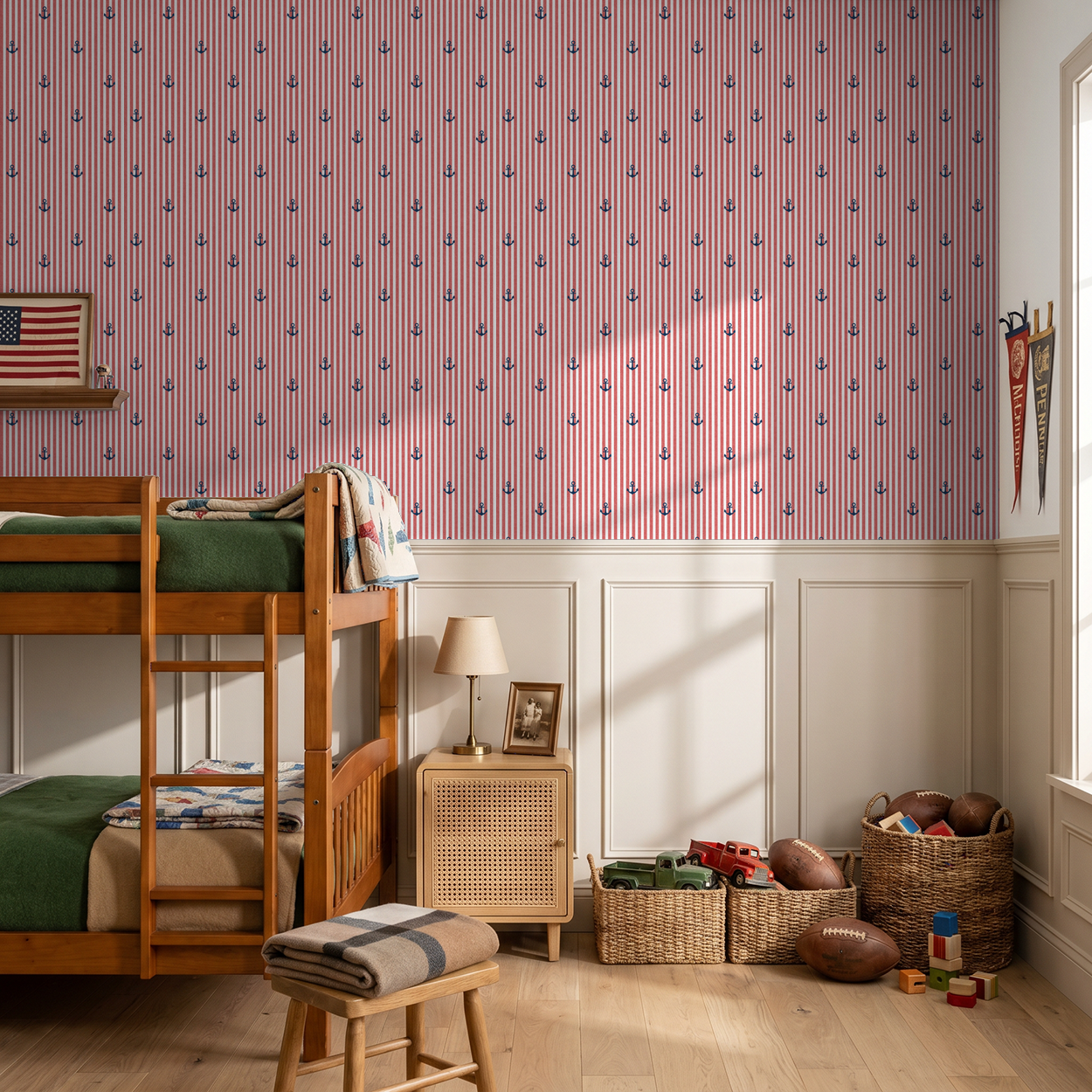 Red and white striped wallpaper with blue anchors in a nautical-themed kids' bedroom.