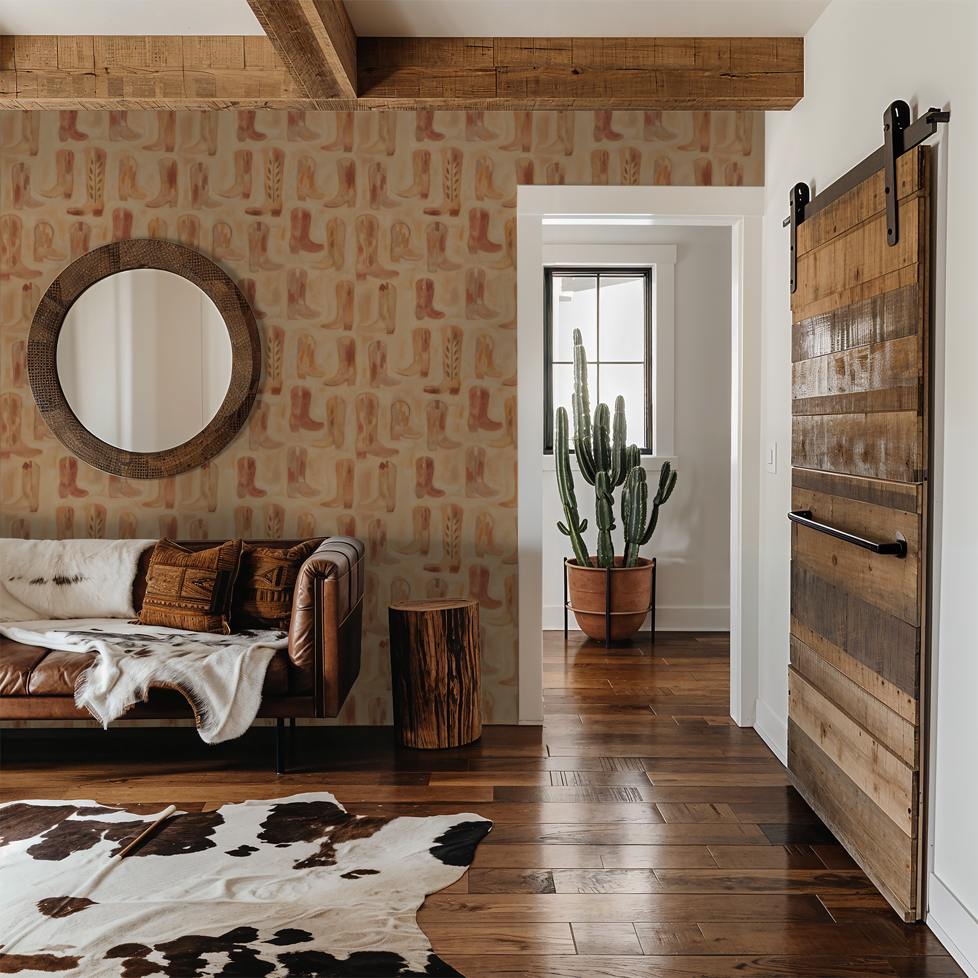 Rustic cowboy boot wallpaper in terracotta and ochre in cozy living room with leather sofa.