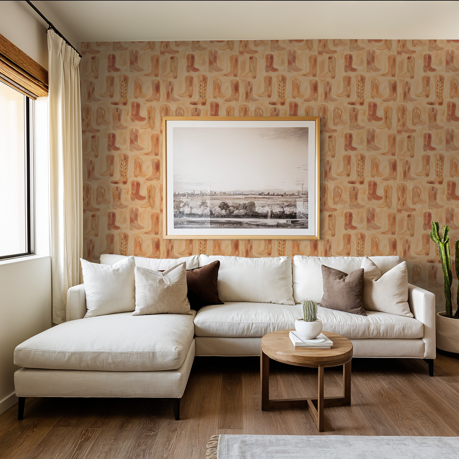 Rustic cowboy boot wallpaper in terracotta and ochre in cozy living room with white sofa.