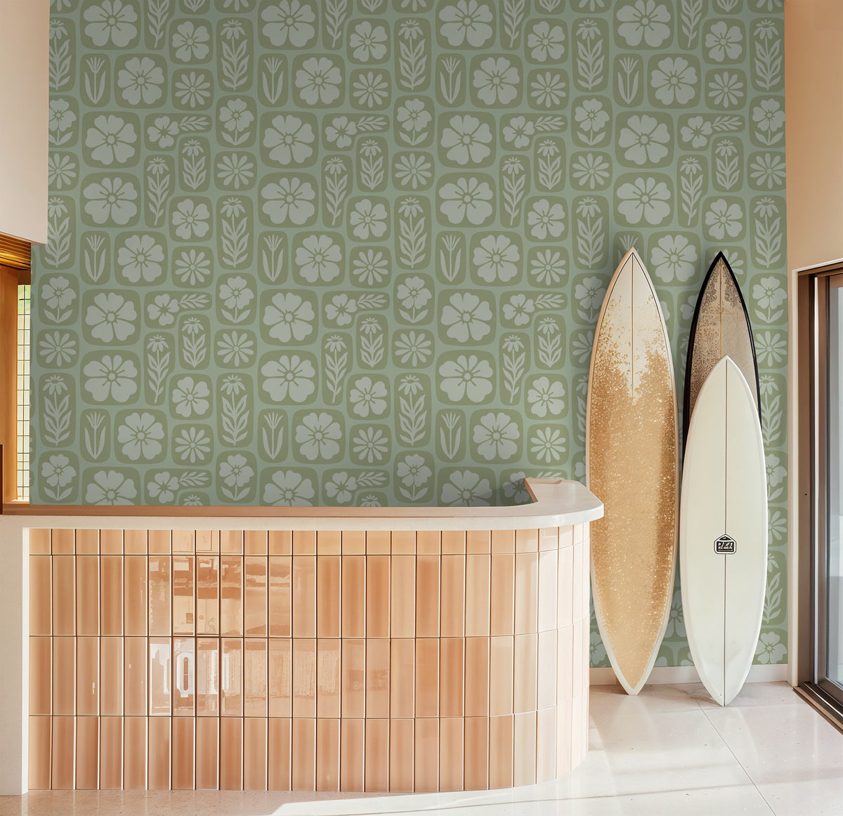 Sage green floral wallpaper with surfboards in a modern room setting.