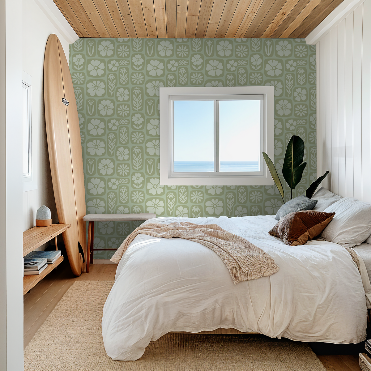 Sage green floral wallpaper in a serene bedroom with wooden ceiling and surfboard decor.