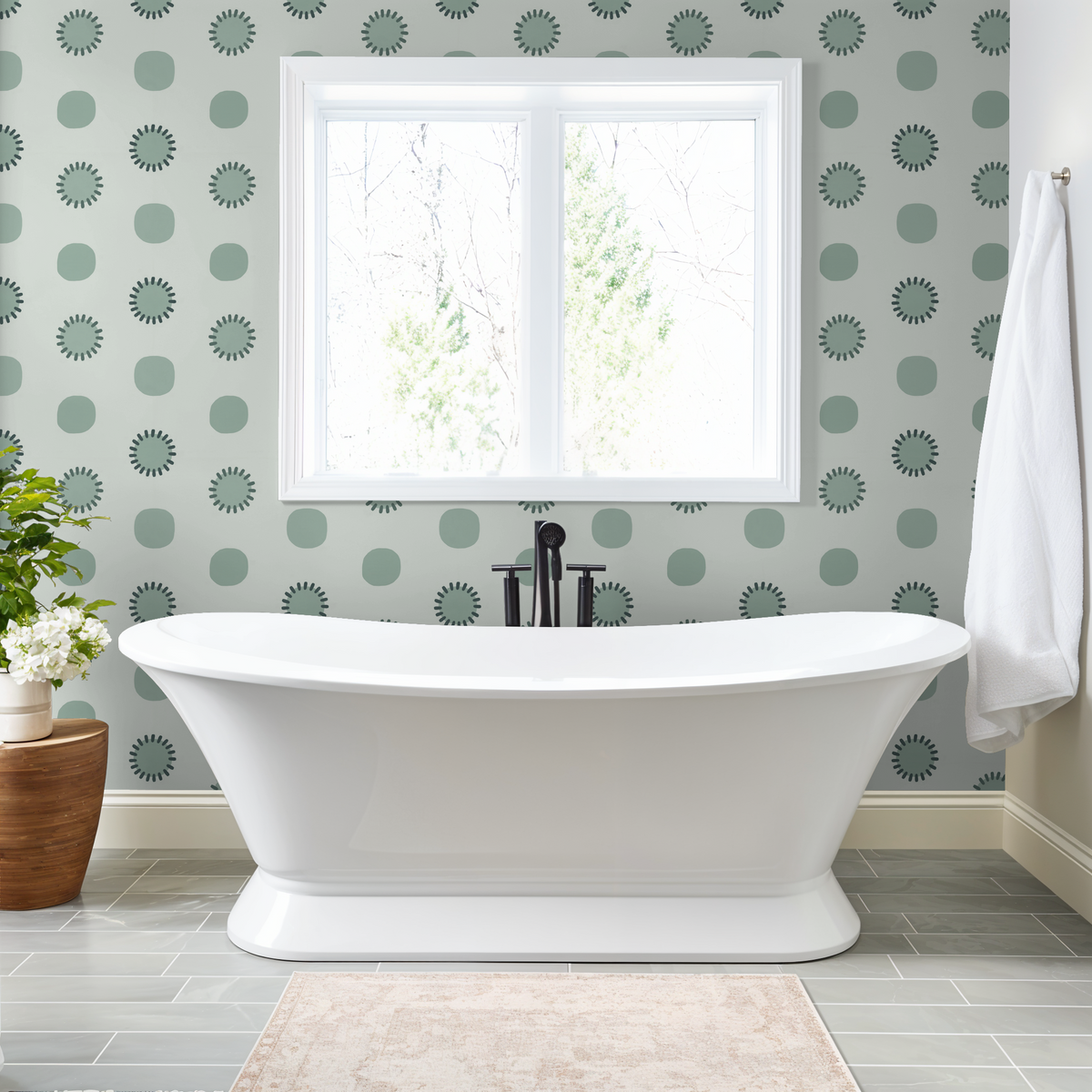 Modern bathroom with sage green geometric circle wallpaper and freestanding tub