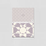 "Pascal Wallpaper sample by Wall Blush, showcasing geometric pattern in a simulated room setting."