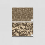 "Wall Blush Burnett Wallpaper sample with floral pattern, ideal for living room decor focus."