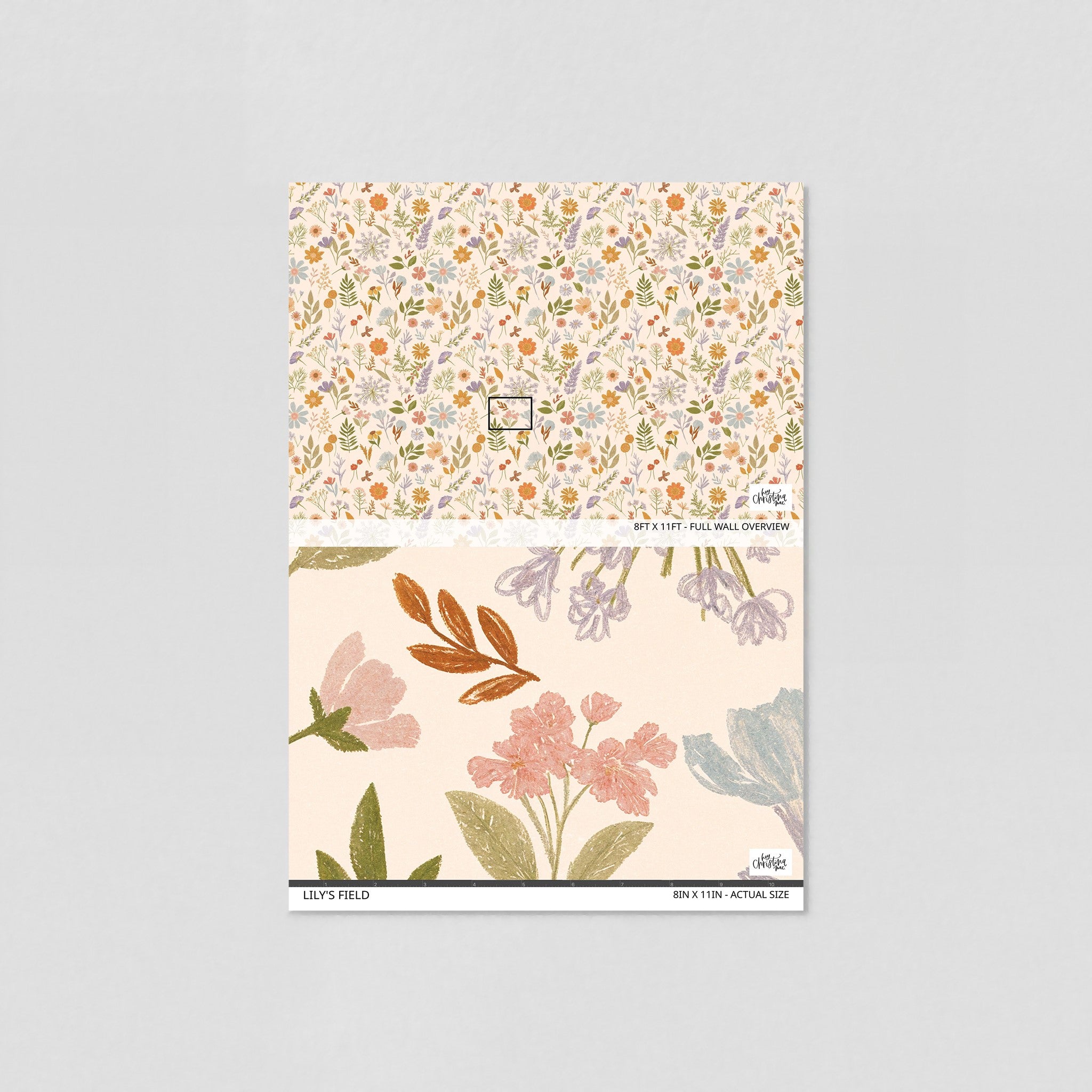 Alt text: "Lily's Field Wallpaper by Wall Blush displayed in living room setting, floral wall decor focal point."