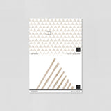 "Wall Blush Love Triangle Wallpaper samples in modern office space, showcasing geometric design focus."