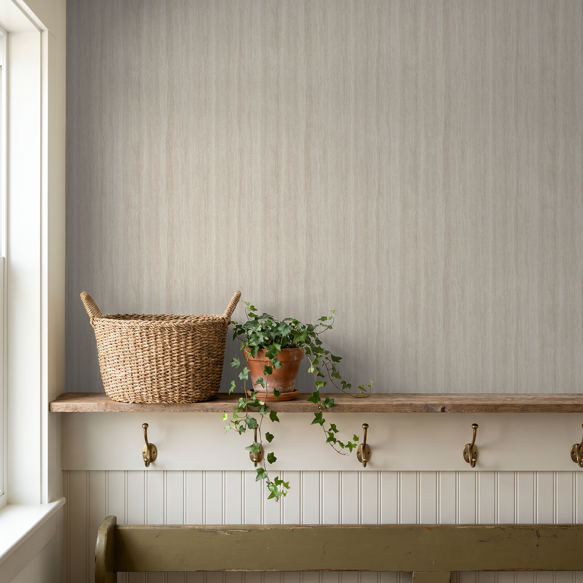 Serene Streaks beige wallpaper in rustic room with plant and basket decor.